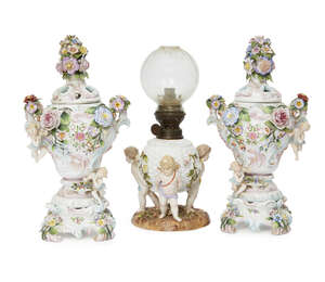 
	
		A pair of Continental porcelain pot pourri vases, late 19th/early 20th century, the...