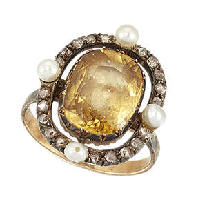 
	
		A topaz, diamond and seed pearl cluster ring, the 19th century cluster with central...