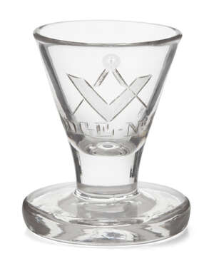 
	
		A Masonic firing glass, late 18th/early 19th century, with conical form bowl, engraved...