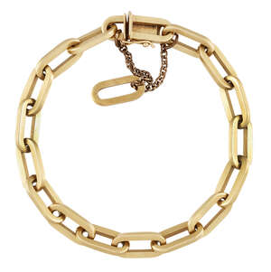 A bracelet, of fetter link design, length 20.0cm, together with one spare link (split) and gilt metal safety chain
		 