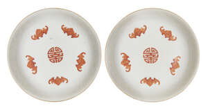 
	
		A pair of Chinese porcelain dishes, Republic period, each interior painted in iron-red...