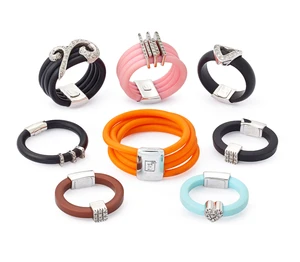 A group of eight rubber rings,&nbsp;in black, brown, blue, orange or pink rubber of square, round or...