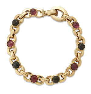 
	
		A gold and tourmaline bracelet, set with cabochon pink and green tourmalines, British...
