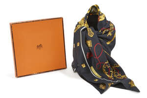 
	
		A Hermes silk scarf, in a black palette with distinctive key design, stamped 'HERMES,...