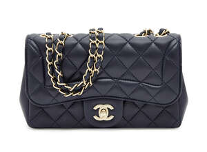 
	
		Chanel: a small Classic Flap navy blue lambskin shoulder bag, the quilted leather with...