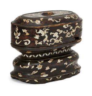 
	
		A Vietnamese lacquer wood and mother of pearl inlaid oval box and cover, 18th century, 