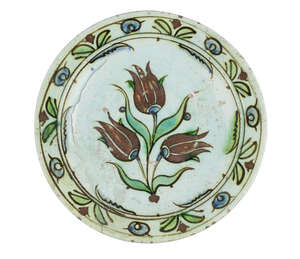 
	
		An Iznik pottery bowl, Turkey, early 17th century, of shallow form, underglaze painted...