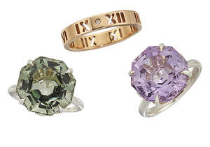 
	
		Three rings, by Tiffany, the first an 'Atlas' ring, the band with pierced Roman numerals...