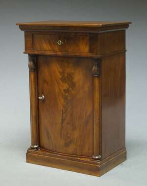 A French mahogany side cabinet, 19th century, the stepped rectangular top over single frieze...