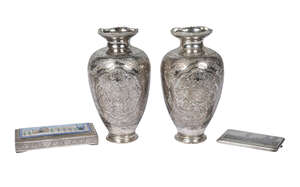 
	
		An Egyptian engraved silver cigarette case, together with an Eastern box with enamelled...