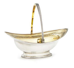 A George III silver and gilt swing handled bowl, London c.1795, Alexander Field, of naiveté form, with engraved border and initials to centre of bowl,  17.5cm