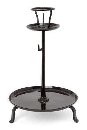 
	
		A Japanese tea ceremony candlestick, 19th century, black lacquered Iron, wide base with...