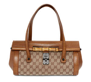 
	
		A Gucci Monogram Bamboo Bullet bag, the rectangular form body decorated with distinctive...
