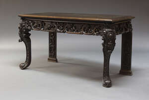 
	
		An Anglo Indian hardwood serving table, early 20th Century and later, the rectangular top...