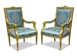 
	
		A pair of Louis XVI style giltwood fauteuils, second half 20th Century, the square backs...