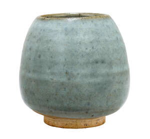 A Chinese junyao bowl, Yuan/early Ming dynasty, of ovoid form, with thick blue-lavender glaze thinning to mushroom tone around the rim, straight broad footrim,
