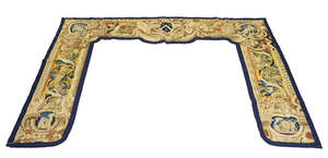 
	
		A French or Flemish tapestry portico, 19th century and reduced, with central shield...