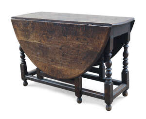 
	
		An oak gate leg table, 18th century, the oval top with two drop leaves, on turned...