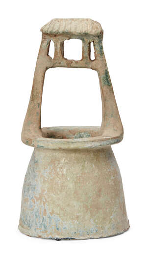 
	
		A Chinese pottery model of a well, Han dynasty, with ridged sloping roof, covered in a...