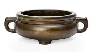 
	
		A Chinese bronze tripod censer, late Qing dynasty, of bombe form, with three squat feet,...