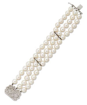 
	
		A cultured pearl and diamond bracelet, composed of three uniform rows of cultured pearls...