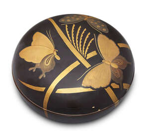 
	
		A Japanese lacquer circular box, early 20th century, decorated with takamaki-e...