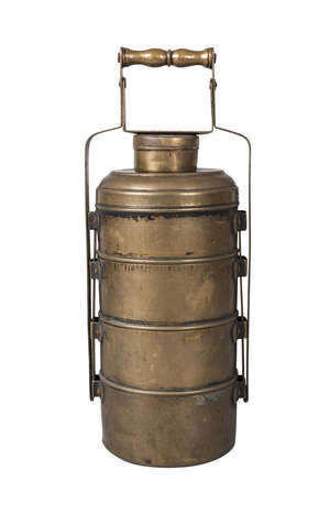 
	
		A Tibetan brass travelling food container, 19th century, of cylindrical form, with five...