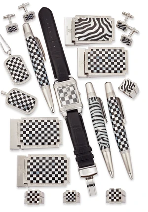 Technocrat. Four stainless steel accessories sets, the first comprising a belt buckle, pendant...