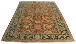 An Egyptian Zeigler carpet, third quarter 20th century, central floral design on a red ground,...
