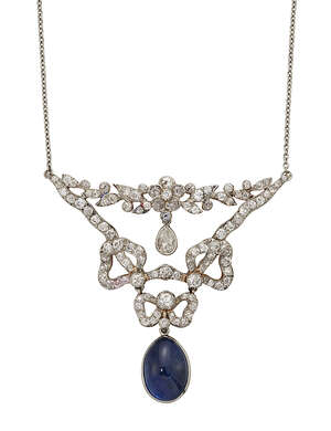 
	
		An early 20th century,  sapphire and diamond pendant necklace,  the triangular...