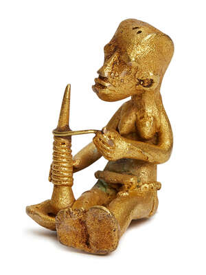 
	
		An African tribal metal alloy figure of a seated man with a mortar, Ivory Coast,...