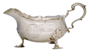 
	
		An Edwardian silver sauce boat, Birmingham, c.1908, B&L, the body with engraved armorial...