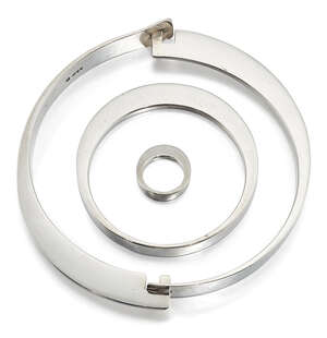 
	
		Tony Laws (British b.1935) a 1970s silver trio of collar, bracelet and ring,
		Mark of...