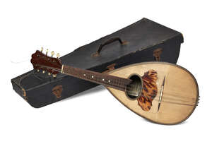
	
		An Italian Il Globo mandolin, 20th century, in a hard case, the mandolin 61cm long,...