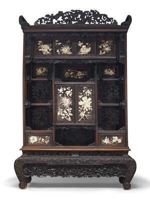 
	
		A Japanese ivory and mother of pearl inlaid rosewood shodana, Meiji period, with carved...