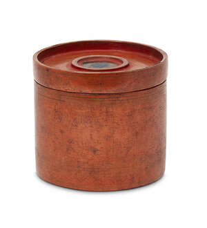 
	
		A Burmese red lacquer cylindrical box and cover, 19th century, decorated with stylised...