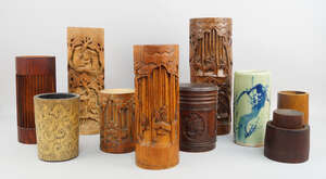 
	
		Four Chinese bamboo pots, mid 20th century and later, decorated with carved scenes,...