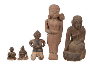 
	
		A Thai carved wood Buddha and four pottery fertility figures, 17th-19th century, 19cm-5cm...