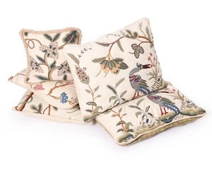 A group of five modern crewelwork cushions, by the Designer's Guild, including two with...