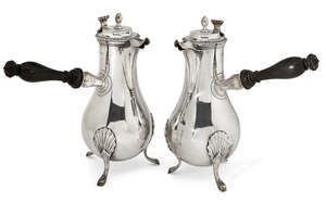 
	
		A pair of Victorian silver chocolate pots, London, c.1899, Daniel & John Wellby, the...