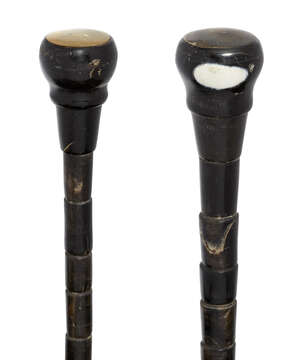 
	
		Two horn walking canes, early 20th century, of tapering sectional construction, 84 and...