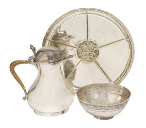 Duchess of Sutherland Cripples Guild, a silver-plated copper jug with hinged cover
		c.1910, stamped D.S.C.G with coronet
		The hinged cover with acorn decor