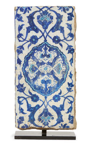 
	
		A blue and white Iznik pottery border tile, Ottoman Turkey, circa 1540, of rectangular...
