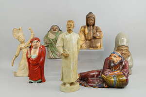 
	
		A Chinese pottery propaganda figure of man, early 20th century, 34cm high, together with...