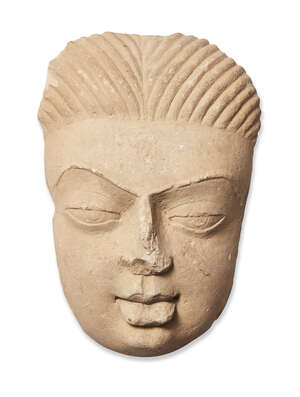 RTOA large sandstone face of Buddha, India, Gupta period, with peaceful expression, the thin eyebrows arched, the almond-shaped eyes with eyelids outlined, the