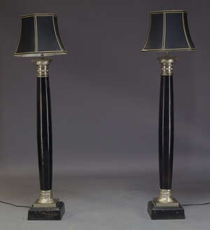 
	
		A pair of modern steel and ebonised standard lamps, of recent manufacture, each of...