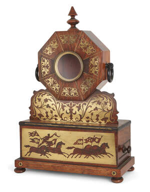 
	
		A Regency rosewood and brass inlaid clock case, the brass bezel within octagonal case...