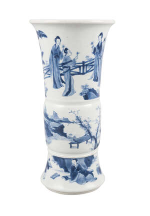 A Chinese porcelain beaker vase, Xuande mark, Kangxi period, painted in underglaze blue with three panels of figures in a continuous landscape, underglaze blue