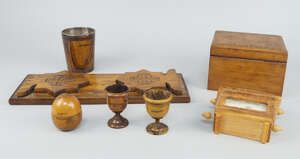 
	
		A group of Palestinian olivewood items, 20th century, mostly with inscription Jerusalem...