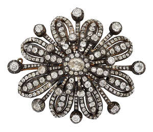
	
		A late 19th century diamond brooch,  of old-cut diamond openwork flowerhead design with...
